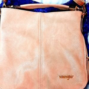 Genuine Wrangler Brand leather crossbody bag. Used  once. Numerous pockets.